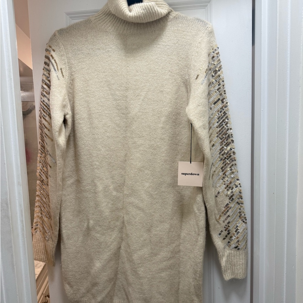 Cream long sleeve turtleneck neck sweater dress 
Sequins detail on sleeves